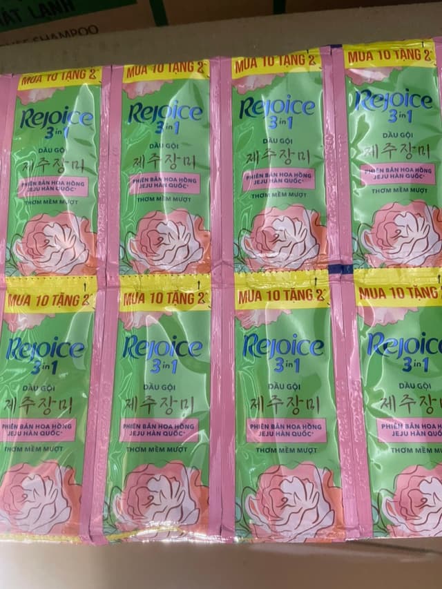 Dây Dầu Gội Rejoice Màu Hồng ( Tóc Rối )