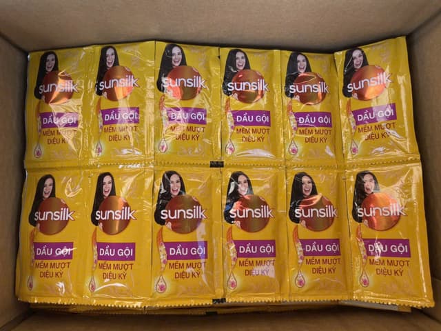 Dây Dầu Gội SunSilk Vàng. ( Thùng 84 dây giá 7,500)