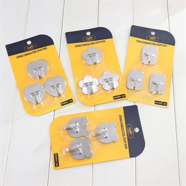Vỉ 3 móc dán tường Inox vỉ vàng.